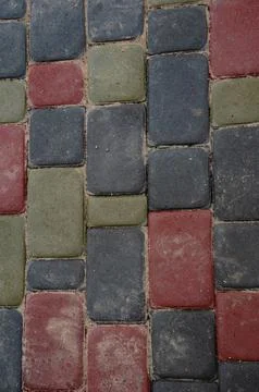 Abstract background. Old cobblestone pavement close-up. City Stock Photos