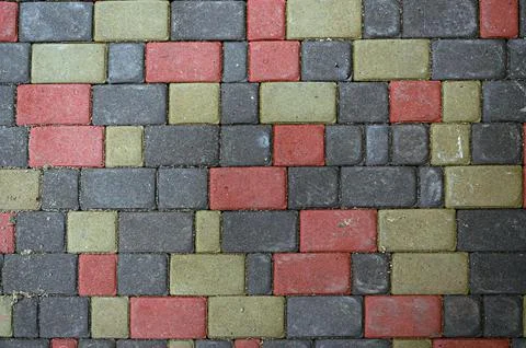 Abstract background. Old cobblestone pavement close-up. City Stock Photos