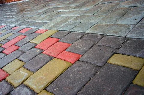 Abstract background. Old cobblestone pavement close-up. City Stock Photos