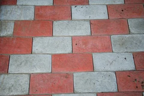 Abstract background. Old cobblestone pavement close-up. City Stock Photos