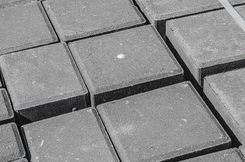 Abstract background. Old cobblestone pavement close-up. City Stock Photos