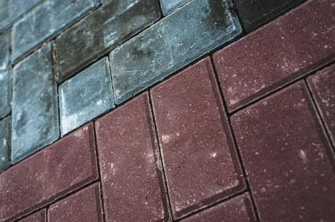 Abstract background. Old cobblestone pavement close-up. City pattern, Stock Photos