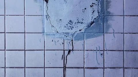 Abstract background old cracked square ceramic tile. Old tiles background o.. Foto stock