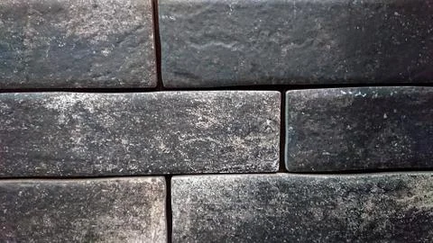 The abstract background of a old gray wall. Selective focus. Stock Photos