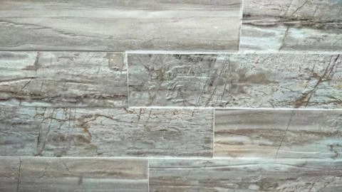 The abstract background of a old gray wall. Selective focus. Stock Photos