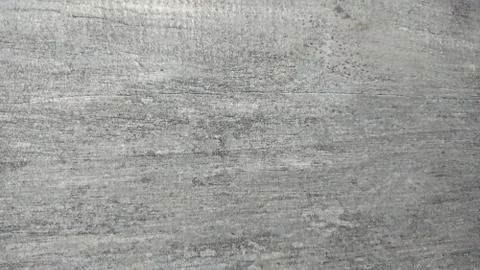 The abstract background of a old gray wall. Selective focus. Stock Photos