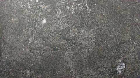 The abstract background of a old gray wall. Selective focus. Stock Photos