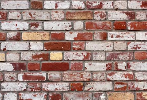 Abstract background of an old weathered rough brick wall Stock Photos