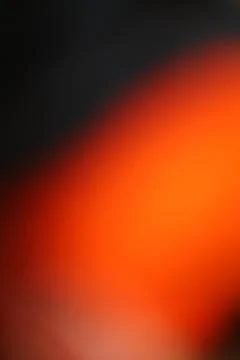 Abstract Background of Orange and Black Gradient with Smooth Transitions Stock Photos