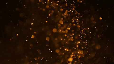 Abstract background with orange glittering particles in motion Stock Footage 241087813