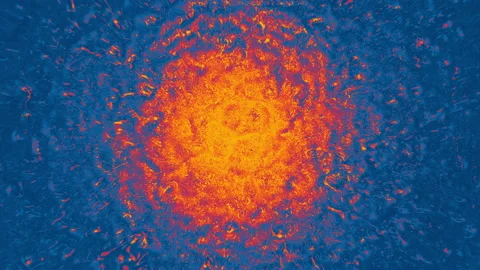 Abstract background of orange paint spreading from center Stock-Footage 134328046