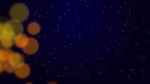 Abstract background - orange particles flying on the blue background.  Stock-Footage 70021210