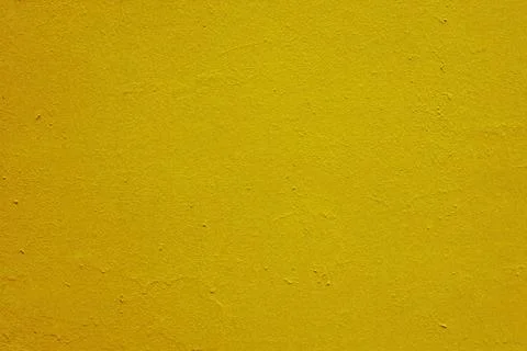 Abstract background of orange plaster on the wall. Stock Photos