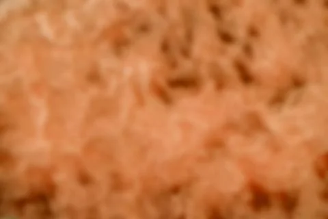 An abstract background out of focus of a orange color 스톡 일러스트