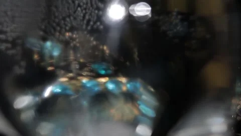 Abstract background of overflowing bright lights and tiny water bubbles Видео 318580287