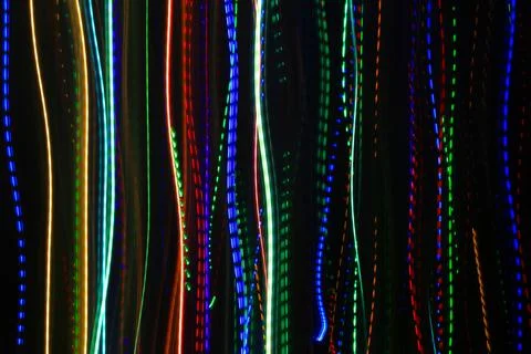 Abstract background with pattern from colorful traces of lights Stock Photos