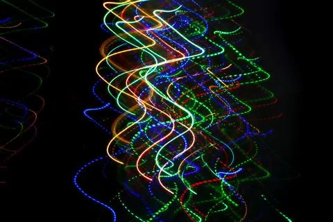 Abstract background with pattern from colorful traces of lights Stock Photos