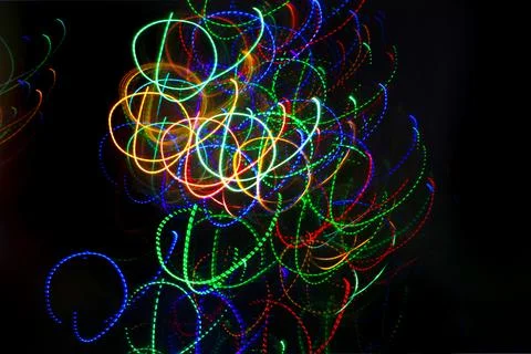 Abstract background with pattern from colorful traces of lights Stock Photos