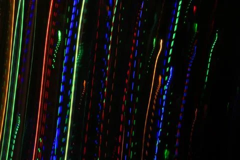 Abstract background with pattern from colorful traces of lights Stock Photos