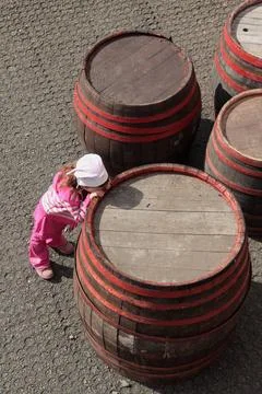 Abstract background pattern Sad, lonely child leaning on the barrel. Copyr... Stock Photos
