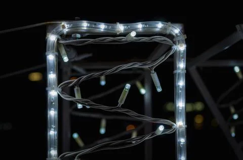 Abstract background pattern small lamps on a black background close up Stock-Fotos