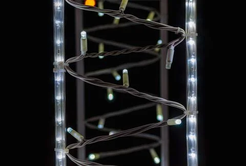 Abstract background pattern small lamps on a black background close up Stock Photos