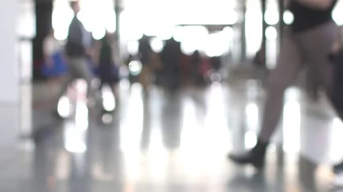 Abstract background of people going about their business in the lobby in the Stock Footage 74514548