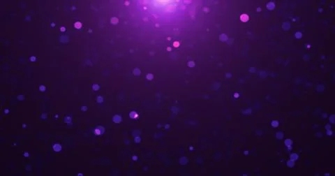Abstract background of purple luminous particles and bokeh dots of festive .. Foto stock