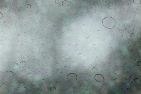 Abstract background with raindrops and colored bokeh Stock Illustration