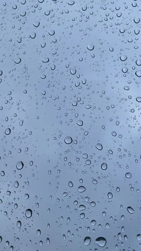 Abstract background with raindrops on glass. Phone screensaver. Stock Footage 301719341