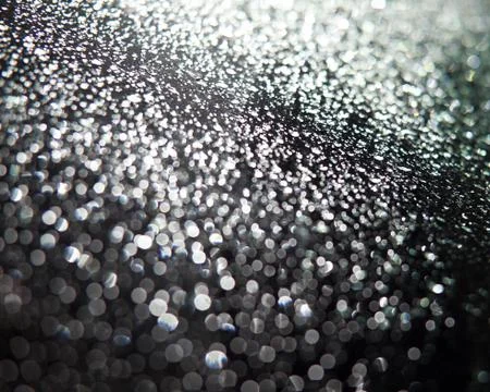 Abstract background (raindrops on a window dispersing and reflec Stock Photos