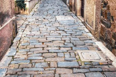 Abstract background of a rectangular block in the courtyard of a European cit Stock Photos