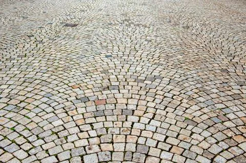Abstract background of rectangular paving stones in a semicircle. Stock Photos