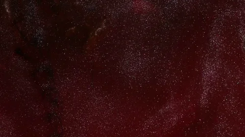 Abstract Background Red and Black Clouds with Waves of Silver Glitter Stock Footage 76589330