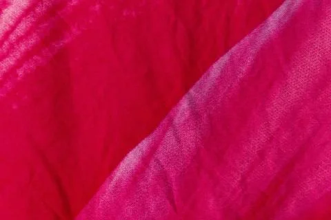 Abstract background. Red and white surface of the fabric material. Stock Photos