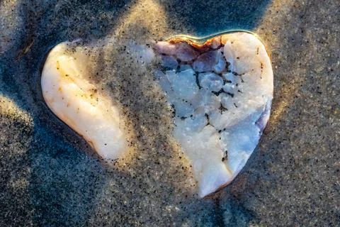 Abstract background with red and white stone covered with sand Stock Photos