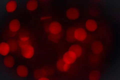 Abstract background red bokeh circles. Beautiful background with particles. T Stock Photos
