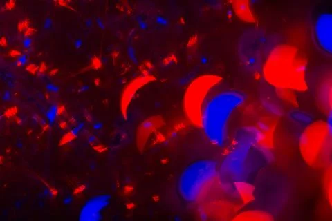 Abstract background red bokeh circles. Beautiful background with particles. T Stock Photos