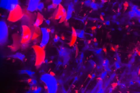 Abstract background red bokeh circles. Beautiful background with particles. T Stock Photos