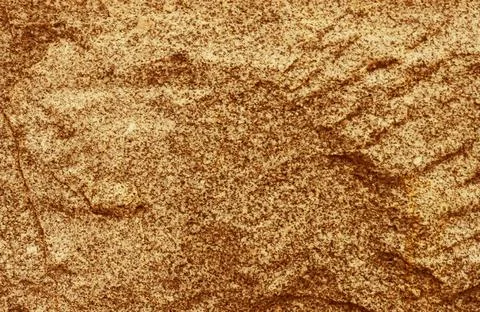 Abstract background from the relief surface of the stone close-up. Stock Photos