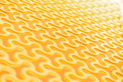 Abstract background, a repeating pattern of gold curved round cells in Stock Photos