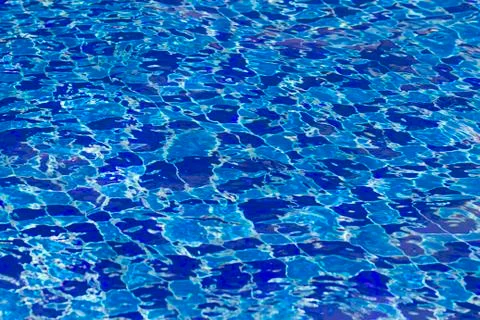 Abstract background from ripple in blue pool Stock Photos