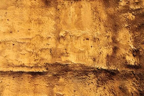 Abstract background of rough yellow wall texture, vibrant Foto stock