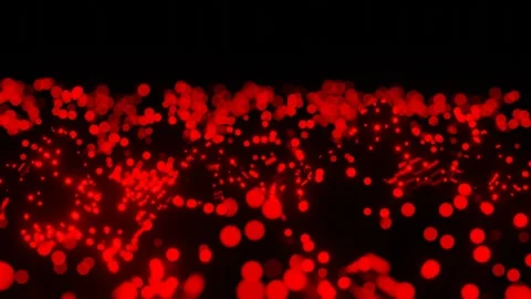 Abstract background round red glowing particles slowly moving on black backgroun Video stock 310507417