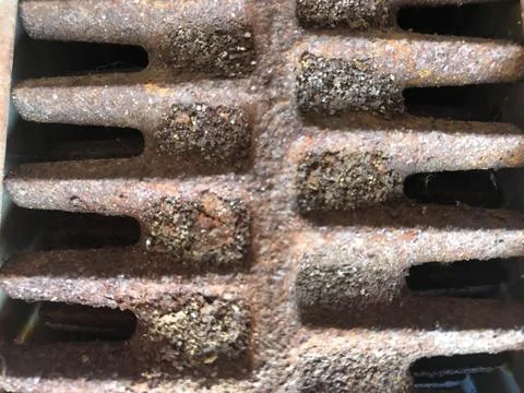 Abstract background of a rusty grill. Stock Photos