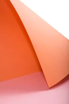 Abstract background from sheets of orange and pink Stockfoto's