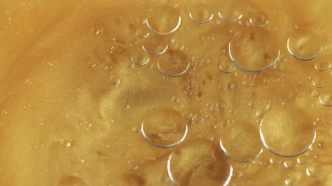 Abstract background shimmering bubbles yellow Video stock 255638945