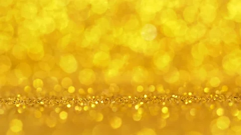 Abstract background, shining, sparkling lights of golden color glitter texture Stock Footage 147706778
