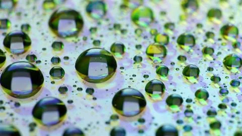 Abstract background with shiny water drops, rain on the glass. Stock Photos