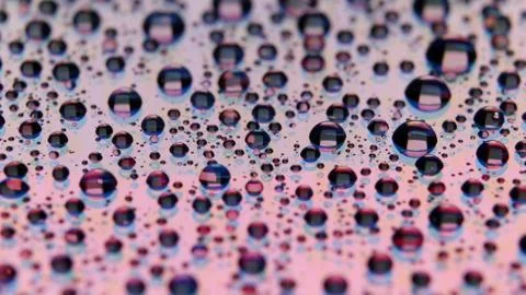 Abstract background with shiny water drops, rain on the glass. Stock Photos